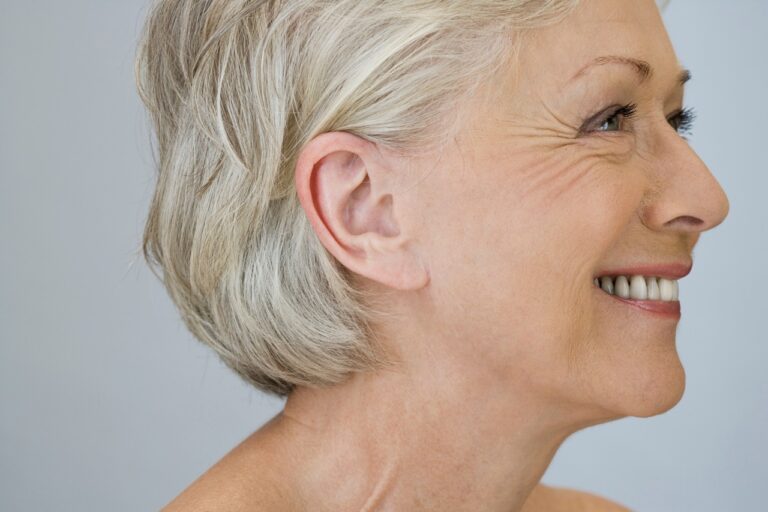 smiling woman with silver hair