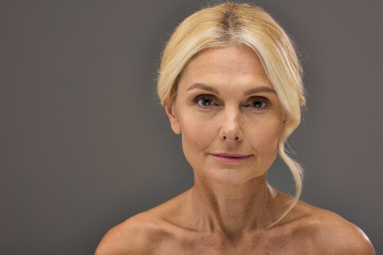 smiling older woman with blonde hair